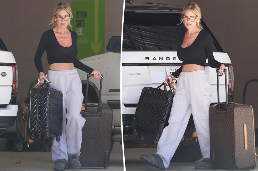 Kim Zolciak takes designer luggage out of storage unit amid financial woes