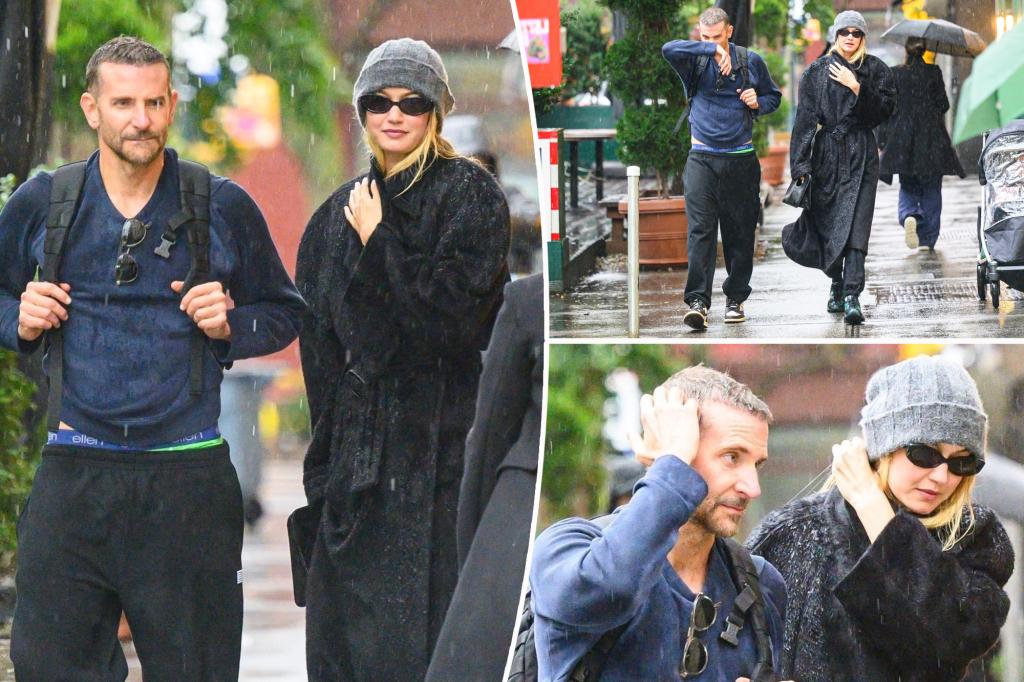 Bradley Cooper and Gigi Hadid brave the NYC rain as they continue to fuel romance rumors