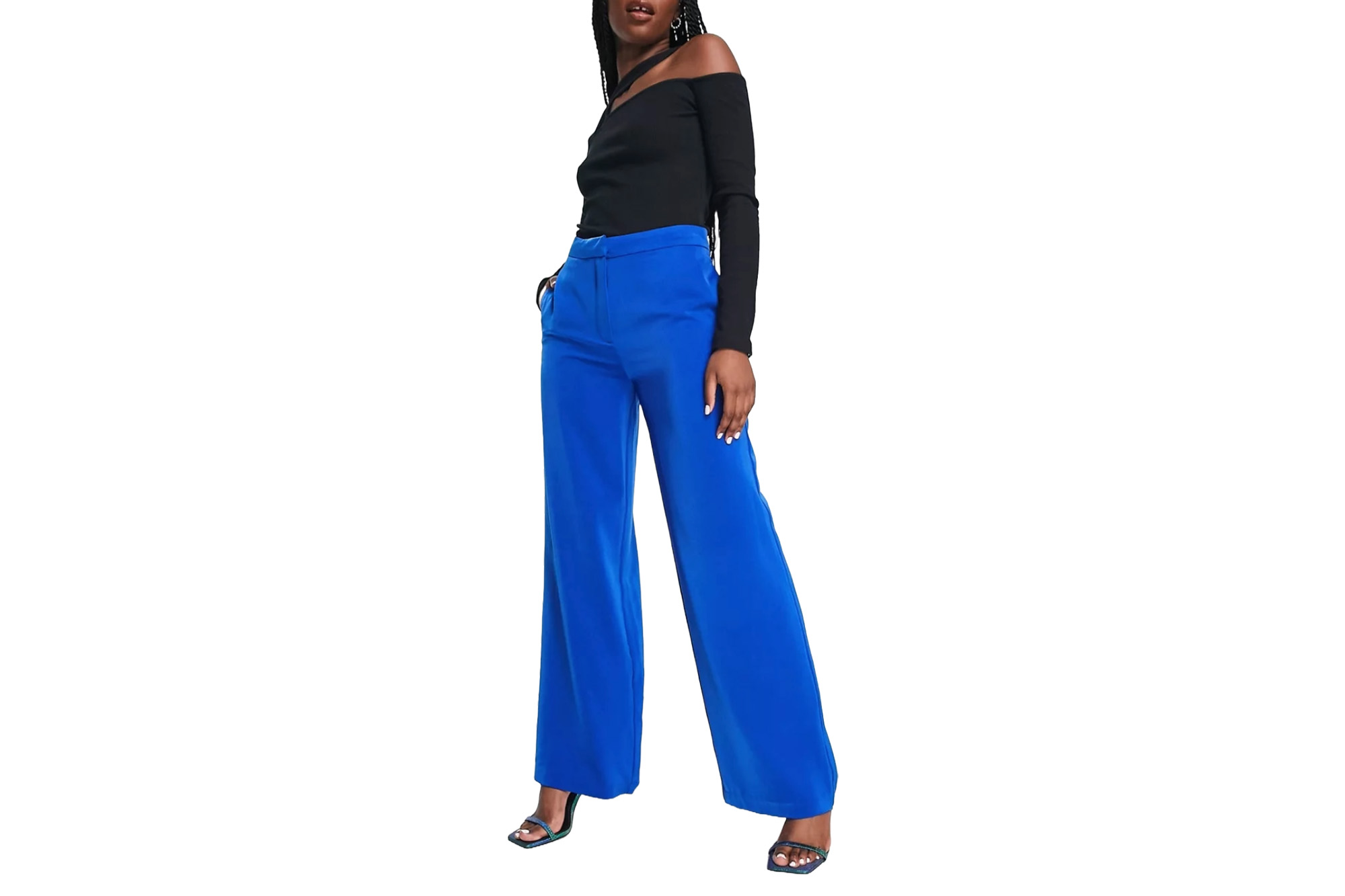 A model in blue high-waisted pants