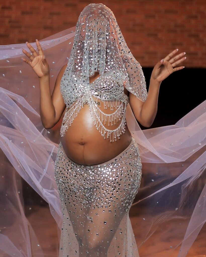 Sheebah Karungi captivates fans with her dazzling pregnancy reveal during the Neyanziza Concert