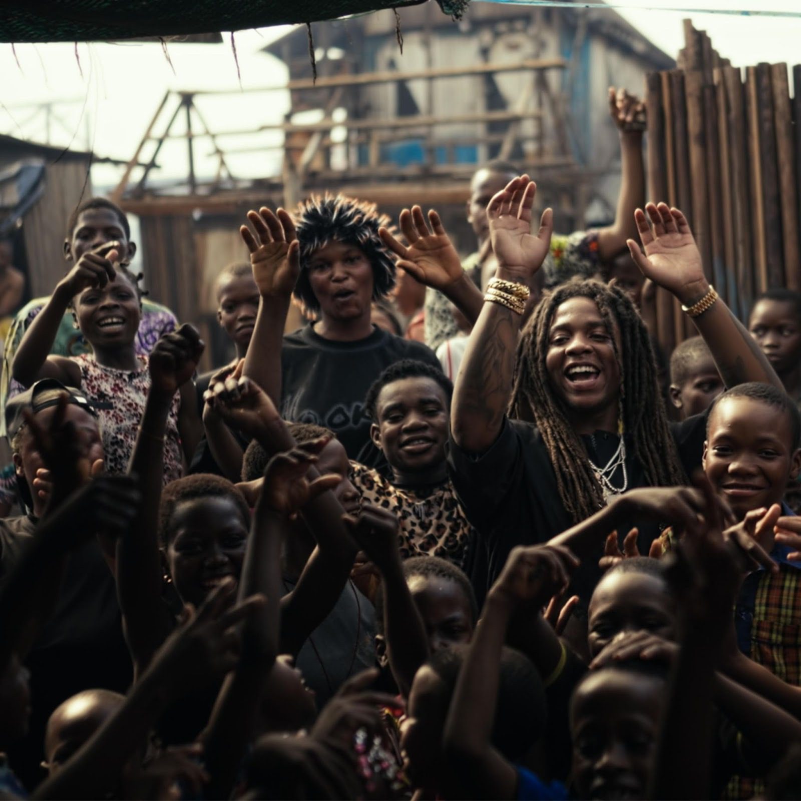 Hurricane Wisdom vibes out on Afrobeats-inspired “LIVING UP,” honoring his Nigerian roots